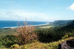 Scenic view of Tarague MWR beach from road cut in hills separating the beaches from Anderson main base.