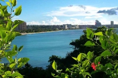 View across Guam's Tumon bay looking South from the Okura Hotel cliff line to the Guam Hilton.