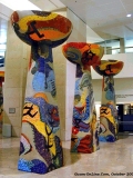 Multi-colored Latte stone Guam icons in the Won Pat International Airport lobby.