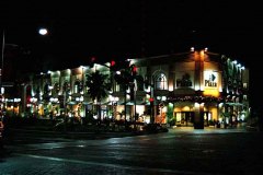 Guam's Tumon tourist shopping and entertainment area at night.